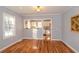 Cozy dining room featuring hardwood floors and a bright window at 1496 S Hairston Rd, Stone Mountain, GA 30088