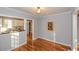 Cozy dining room with hardwood floors and decorative lighting at 1496 S Hairston Rd, Stone Mountain, GA 30088