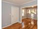 Bright entryway boasts hardwood floors with views of the kitchen at 1496 S Hairston Rd, Stone Mountain, GA 30088