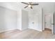 Neutral bedroom with large closet and ceiling fan at 206 Grady Burrell Dr, Holly Springs, GA 30115
