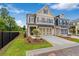 Beautiful townhouse with a well-maintained front lawn and attractive curb appeal at 206 Grady Burrell Dr, Holly Springs, GA 30115