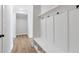 Mudroom featuring coat hooks and built in bench at 206 Grady Burrell Dr, Holly Springs, GA 30115