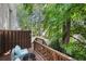 Wooden deck with stairs leading to the private wooded backyard at 3371 Spring Harbour Dr, Atlanta, GA 30340