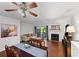 Cozy living room with hardwood floors, fireplace, and sliding glass doors leading to an outdoor space at 3371 Spring Harbour Dr, Atlanta, GA 30340