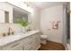 Bathroom featuring a double vanity and brass accents at 398 Baker Nw Cir, Atlanta, GA 30318