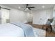 Bedroom featuring hardwood floors and a decorative chair by the window at 398 Baker Nw Cir, Atlanta, GA 30318