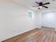 Bedroom with light walls, wood-look floors and natural light at 398 Baker Nw Cir, Atlanta, GA 30318