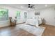 This bedroom has natural light and luxury vinyl flooring with neutral decor at 398 Baker Nw Cir, Atlanta, GA 30318