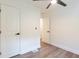 Bright bedroom with wood-look flooring and ceiling fan at 398 Baker Nw Cir, Atlanta, GA 30318