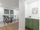 Bright dining area with a modern table set and stylish buffet bar at 398 Baker Nw Cir, Atlanta, GA 30318