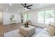 Bright and airy living room features hardwood floors, neutral paint, and abundant natural light at 398 Baker Nw Cir, Atlanta, GA 30318