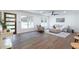 Bright and airy living room features hardwood floors, neutral paint, and abundant natural light at 398 Baker Nw Cir, Atlanta, GA 30318
