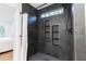 The tiled shower has recessed shelving and a window for extra light at 398 Baker Nw Cir, Atlanta, GA 30318