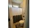 Bathroom features a stylish shower curtain and modern fixtures, offering a functional and appealing space at 605 Red Leaf Way, Canton, GA 30114