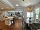 Open dining area with views to living room and kitchen for easy entertaining at 605 Red Leaf Way, Canton, GA 30114