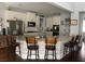 Kitchen island with granite countertop, breakfast bar seating and stainless steel appliances at 605 Red Leaf Way, Canton, GA 30114