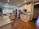 Spacious kitchen with granite countertops, white cabinets and subway tile backsplash at 605 Red Leaf Way, Canton, GA 30114
