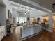 Open concept living space features stone fireplace, large windows, and modern decor at 605 Red Leaf Way, Canton, GA 30114