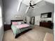 Spacious main bedroom with vaulted ceiling, ensuite, and walk-in closet access at 605 Red Leaf Way, Canton, GA 30114