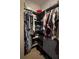 Spacious walk-in closet with ample storage and corner shelving at 605 Red Leaf Way, Canton, GA 30114