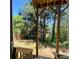 View from back deck features private backyard with natural views and mature trees at 211 Serendipity Way, Dallas, GA 30157