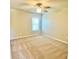 Bedroom featuring a ceiling fan and window with carpet flooring at 211 Serendipity Way, Dallas, GA 30157