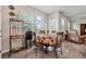 Bright dining area with large windows and an open floor plan, perfect for casual dining at 211 Serendipity Way, Dallas, GA 30157