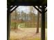 Wooded view of the landscape from inside the pavilion at 211 Serendipity Way, Dallas, GA 30157