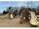 Playground with slides and climbing structures offers a fun recreational area for children to play at 211 Serendipity Way, Dallas, GA 30157
