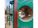 A vibrant tunnel offers a fun and engaging play experience in a community playground at 211 Serendipity Way, Dallas, GA 30157