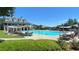 Beautiful community pool featuring a clubhouse, sunshades, and lounge chairs for residents to enjoy at 211 Serendipity Way, Dallas, GA 30157