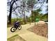 Cyclist enjoying the scenic Silver Comet Trail, great for outdoor activities and recreation at 211 Serendipity Way, Dallas, GA 30157
