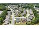 Expansive aerial view of a well-planned community with lush greenery and neatly arranged homes at 431 La Perla Dr, Sugar Hill, GA 30518