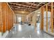 Spacious unfinished basement with a sealed concrete floor, and natural light at 431 La Perla Dr, Sugar Hill, GA 30518