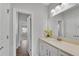 Hall bathroom with cultured marble vanity and tile floors at 431 La Perla Dr, Sugar Hill, GA 30518