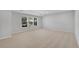 Large bedroom with carpet and natural light at 431 La Perla Dr, Sugar Hill, GA 30518