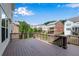 Exterior view of the deck showcasing the wood flooring and railings, with views of the backyard and neighborhood at 431 La Perla Dr, Sugar Hill, GA 30518