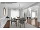 Contemporary dining room showcases bright lighting, clean lines, and stylish furnishings at 431 La Perla Dr, Sugar Hill, GA 30518