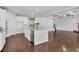 Open kitchen with an island and stainless steel appliances is great for entertaining at 431 La Perla Dr, Sugar Hill, GA 30518