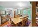 Elegant dining room showcasing a wooden table, chairs, and a decorative cabinet at 51 Vienna Way, Douglasville, GA 30134