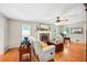 Comfortable living room with hardwood floors, a brick fireplace, and cozy seating at 51 Vienna Way, Douglasville, GA 30134