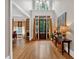 Elegant foyer with hardwood flooring, high ceilings, and natural light at 511 Etris Ct, Roswell, GA 30075