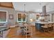 Open kitchen featuring a center island with seating, stainless steel appliances, and breakfast area at 511 Etris Ct, Roswell, GA 30075