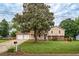 Charming two-story home with a well-manicured lawn and attached two-car garage at 618 Nw Summerville Dr, Lawrenceville, GA 30046