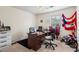 This office space is equipped with a large desk, a comfortable chair, and a window for natural light at 618 Nw Summerville Dr, Lawrenceville, GA 30046