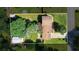 An aerial view shows the property and grounds, featuring a storage shed and pool at 618 Summerville Dr, Lawrenceville, GA 30046