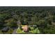 A charming home is nestled among mature trees on a well-manicured lot in a quiet residential neighborhood at 618 Summerville Dr, Lawrenceville, GA 30046