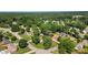 Overhead image of neighborhood featuring tree coverage and well maintained lawns at 618 Summerville Dr, Lawrenceville, GA 30046