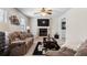 Cozy living room featuring a fireplace, plush seating, and a warm, inviting atmosphere at 618 Summerville Dr, Lawrenceville, GA 30046