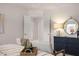 Primary bedroom with double door entry to primary bath, and sitting area at 1021 Merritt Dr # 101, Villa Rica, GA 30180